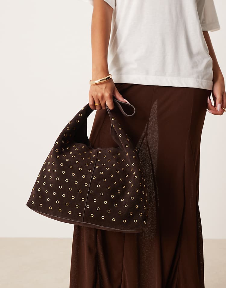 https://images.asos-media.com/products/mango-100-suede-eyelet-large-shoulder-bag-in-dark-brown/209260854-4?$n_750w$&wid=750&fit=constrain