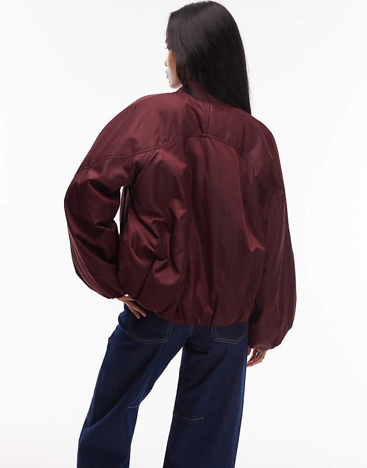 https://images.asos-media.com/products/other-stories-zip-front-bomber-jacket-with-volume-sleeves-in-burgundy-wine/209263692-4?$n_750w$&wid=750&fit=constrain