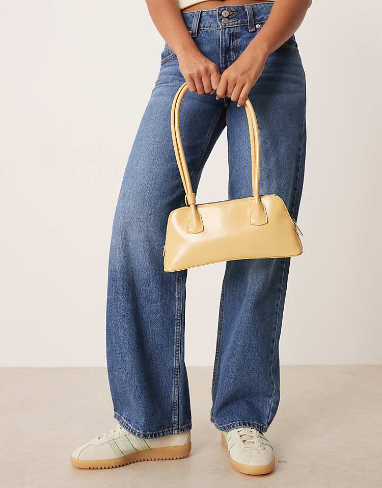 https://images.asos-media.com/products/asos-design-curved-base-bowler-bag-in-buttermilk/209327689-2?$n_750w$&wid=750&fit=constrain