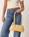 https://images.asos-media.com/products/asos-design-curved-base-bowler-bag-in-buttermilk/209327689-4?$n_750w$&wid=750&fit=constrain
