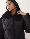 https://images.asos-media.com/products/noisy-may-collar-detail-quilted-short-coat-with-teddy-insert-in-black/209562933-3?$n_750w$&wid=750&fit=constrain